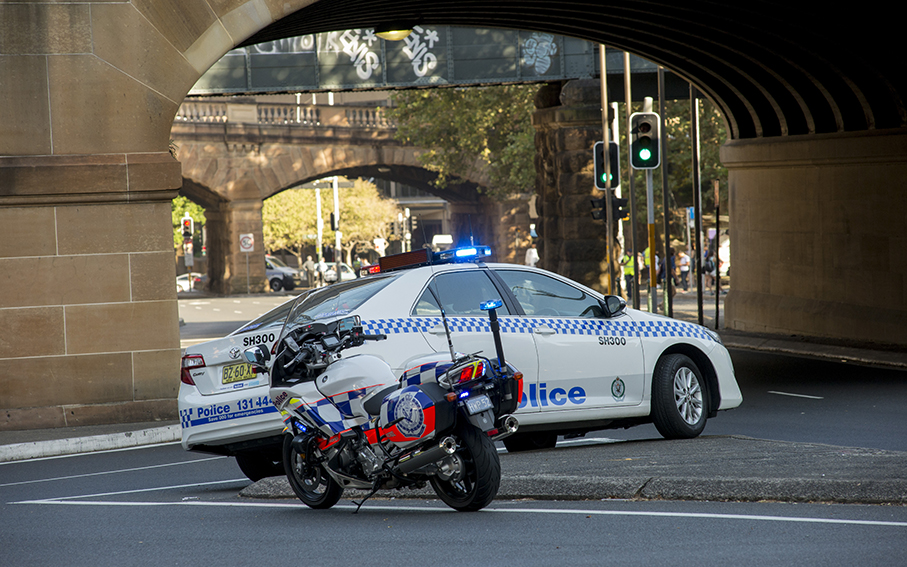 Police vehicles block access to Eddy Avenue during the rescue operation. Photo by Noel Fisher - 25 February 2016.